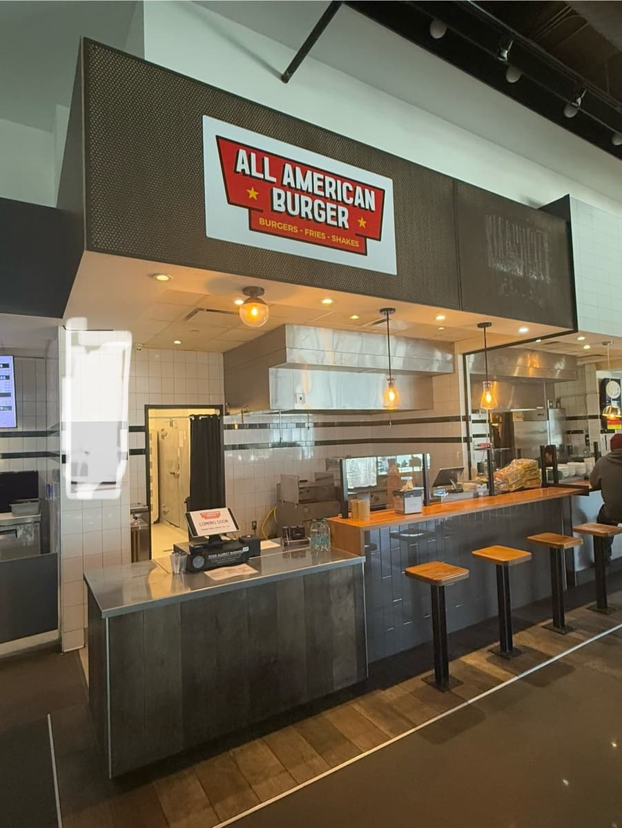 The All American Burger stall inside Inner Rail Food Hall in Aksarben Village